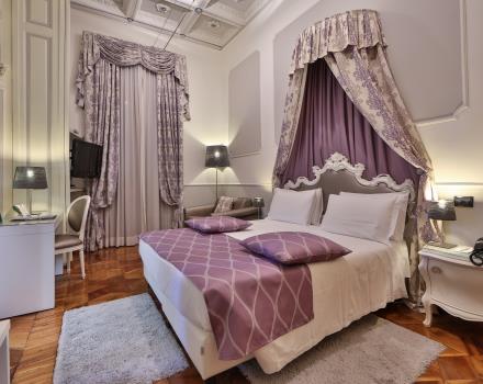 Rest, comfort and elegance in the deluxe rooms of our 4-star hotel
